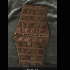  - Oanvänd korsett i storlek M/L från Cubus. Frakt tillkommer om det ska skickas