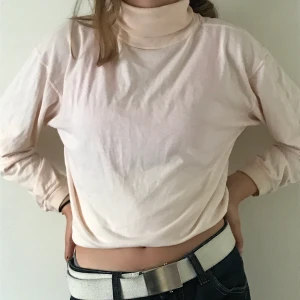 Polotröja  - En ljusrosa polotröja!