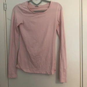 Bodysuit  - En rosa Bodysuit i storleken S