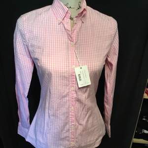 Ny Damskjorta rosa/vit rutig nypris 1100kr köpare betalar frakt eller avhämtar
