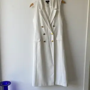 Topshop white longline sleeveless double breasted blazer dress. Can be worn as long waistcoats over jeans & shorts. Size 36. Perfect condition, never worn.