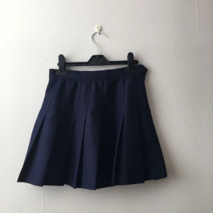  - Mörkblå American Apparel tenniskjol (XS/S)