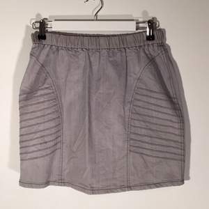 Mini jeans skirt in grey colour