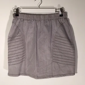  - Mini jeans skirt in grey colour