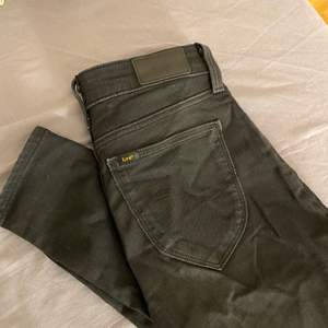 Svarta tajta lee jeans W26 L31