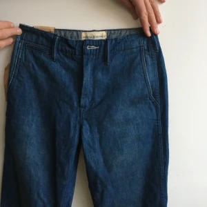 flared jeans ralph lauren - oanvända flared Ralph lauren jeans, storlek 25 x 32. 