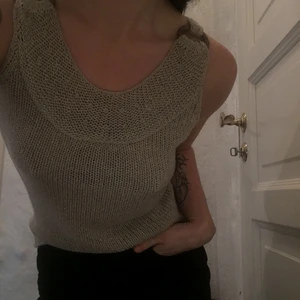 Stickad topp - Stickad topp med snygga detaljer