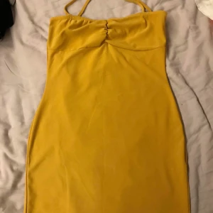 Yellow dress - Used twice only, will fit S and M size, it’s short and nicely skin tight 
