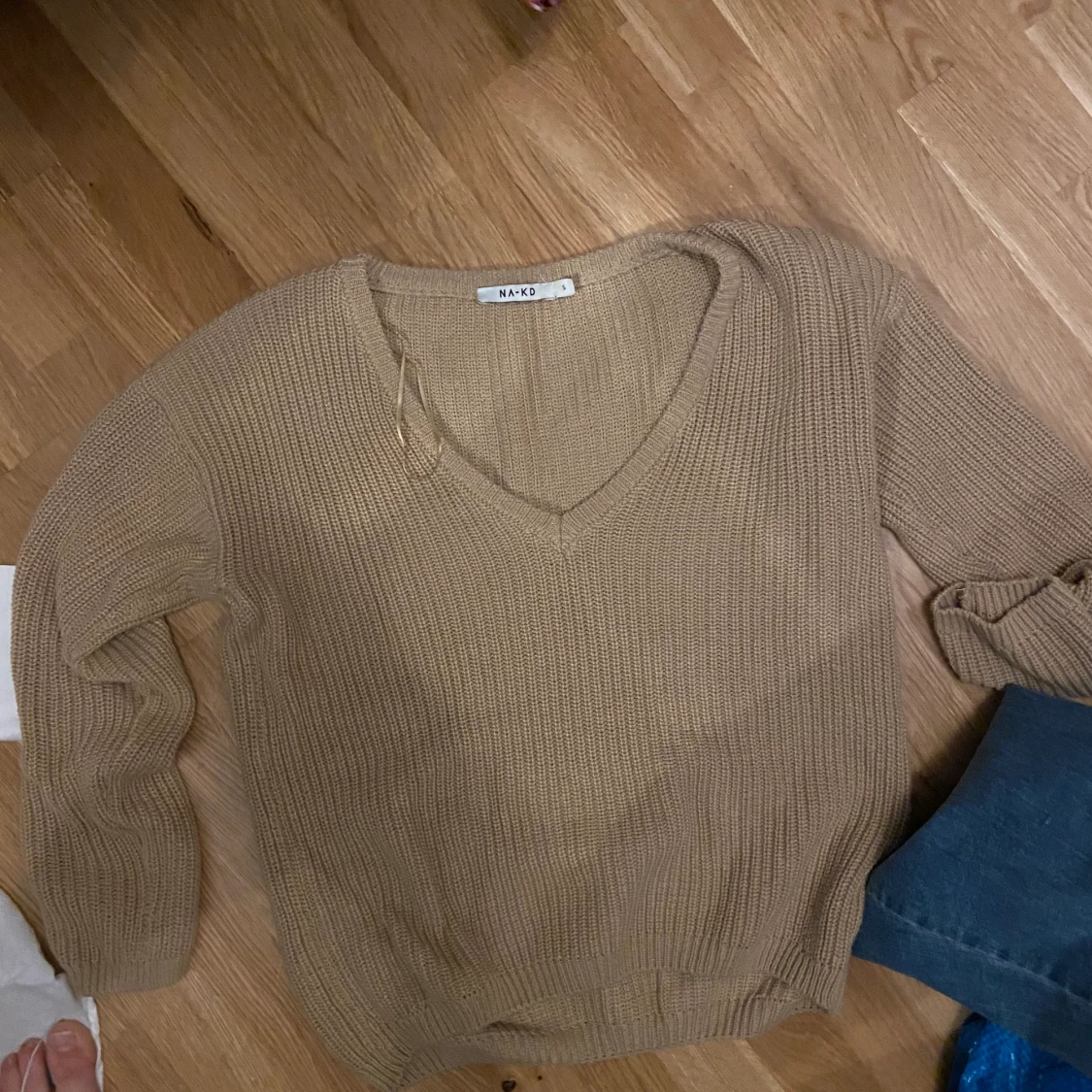 Beige stickad från NAKD - 90