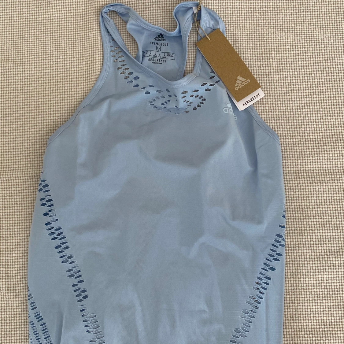 Adidas ljusblått träningslinne 