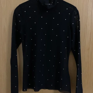 Genomskinlig polo tröja  - Aldrig använd 