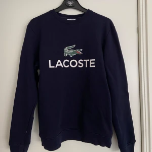 Lacoste tröja  - Lacoste tröja i fint skick. 