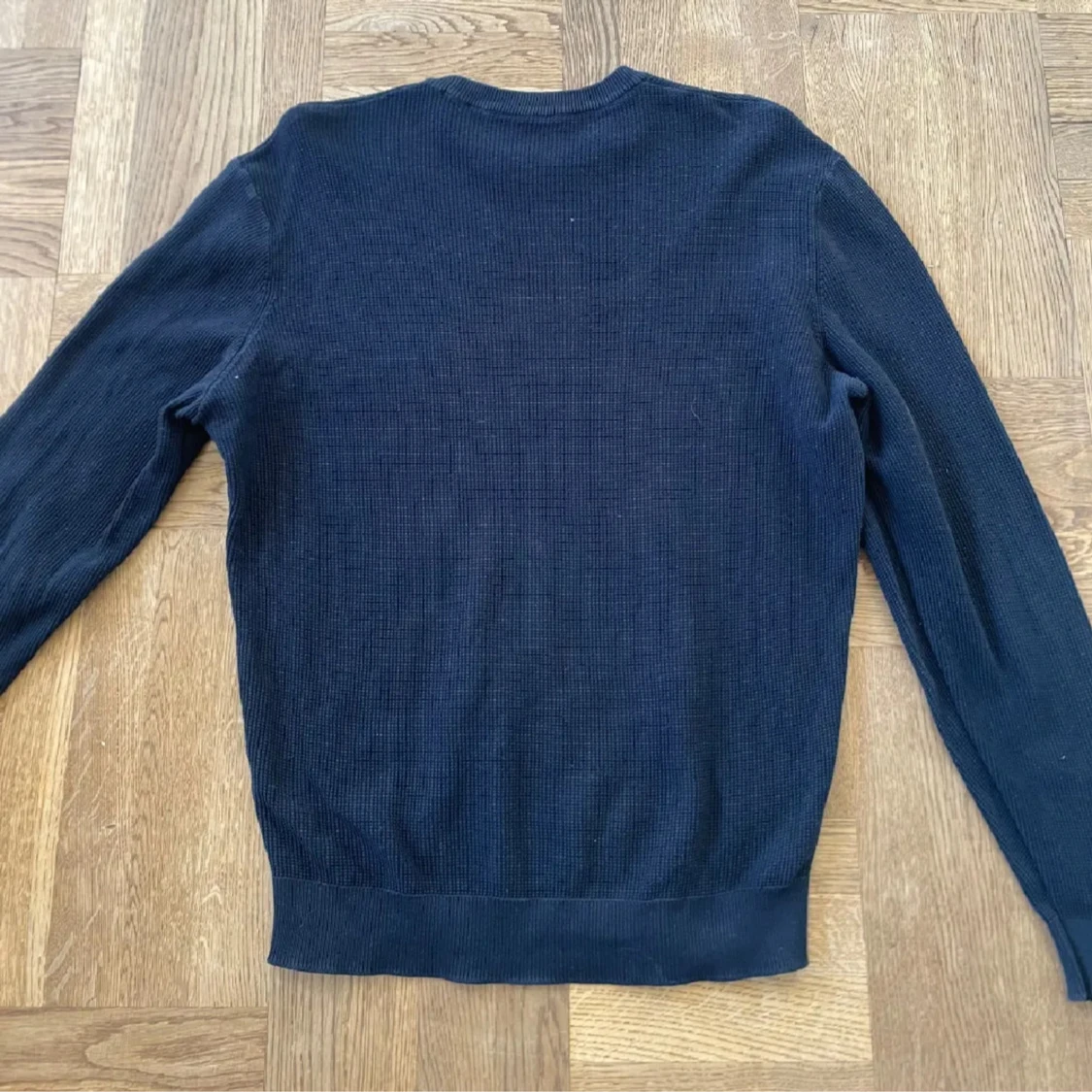 Marin blå stickad tröja  - 90