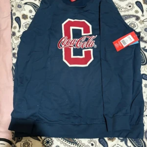 Coca cola tröja XL - Helt ny tröja  Storlek XL  Lappen sitter kvar 