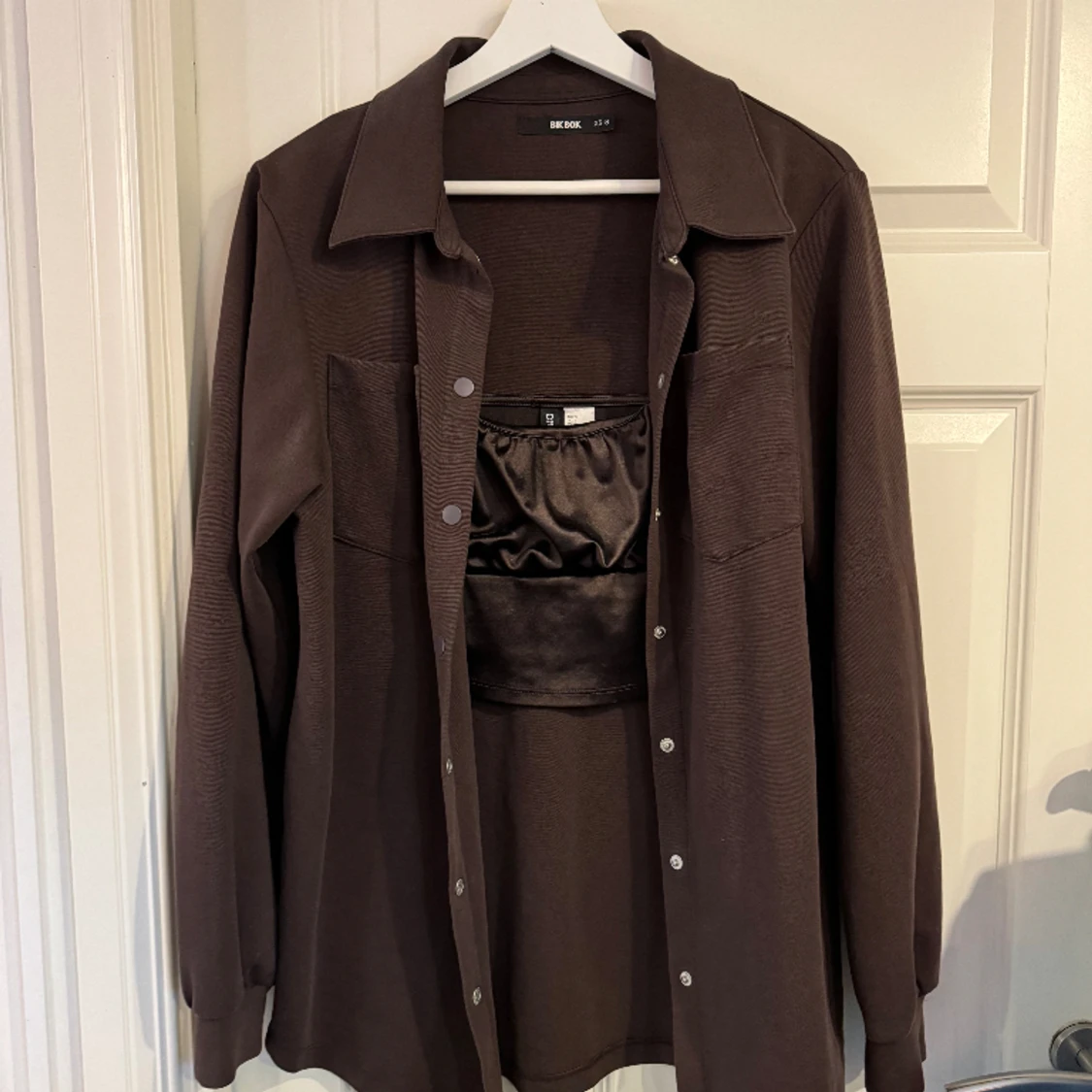 Set av vårjacka och topp