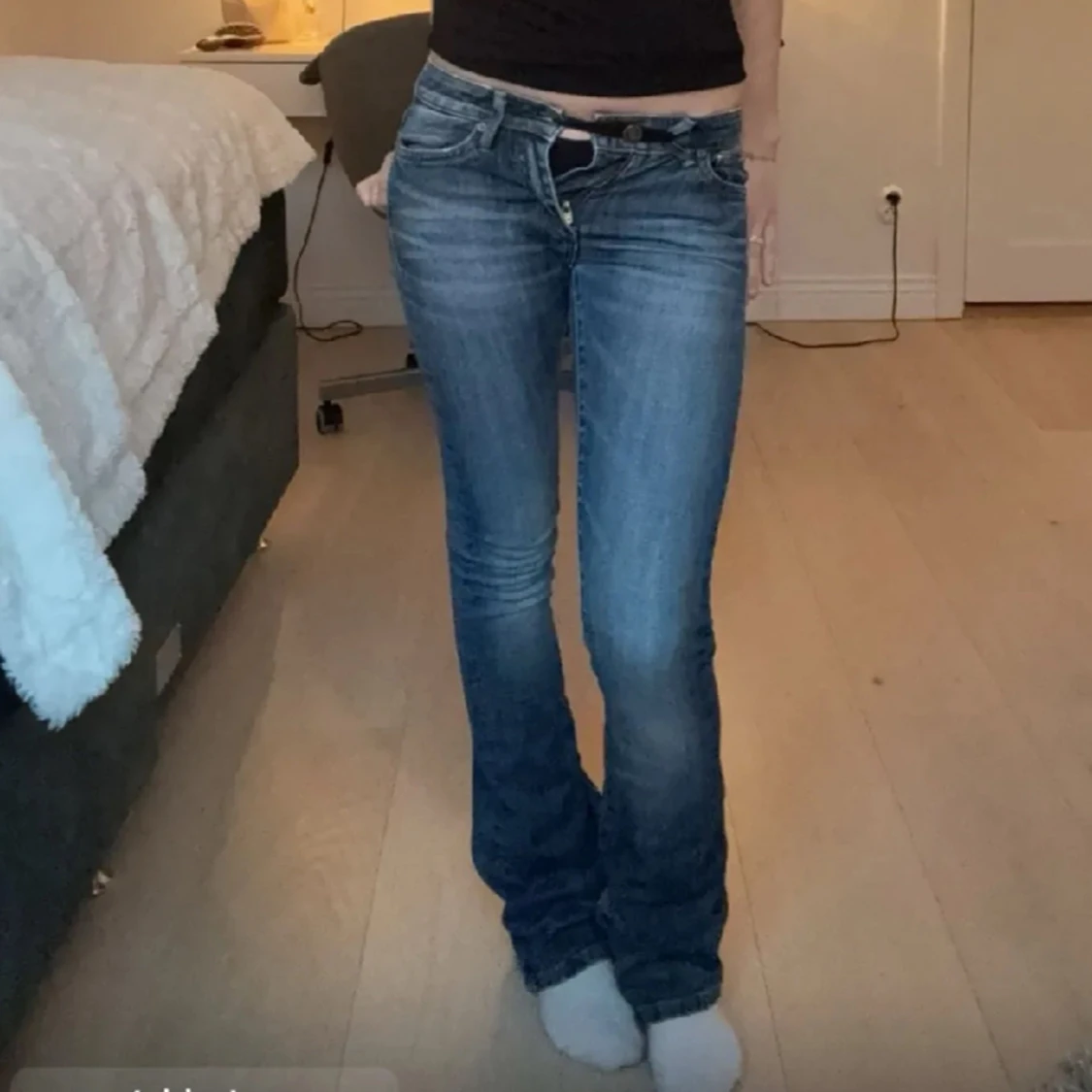 Lågmidjade utsvängda jeans - 90