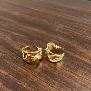 Gold plated earrings from pilgrim 