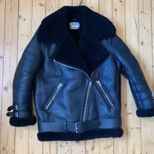 Incredible piece from Acne Studios. Very gently used still in great condition. Details and leather is in very good condition. Fits relaxed and oversized. Tagged size 32, fits 32-34.