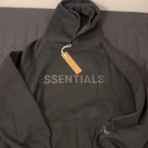 Essentials hoodie - Storlek M Lös passform Helt ny Prislappen är kvar
