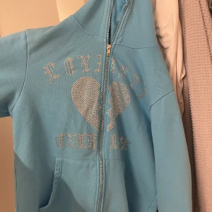 Trotherz - Skön zip rhonstone tröja 