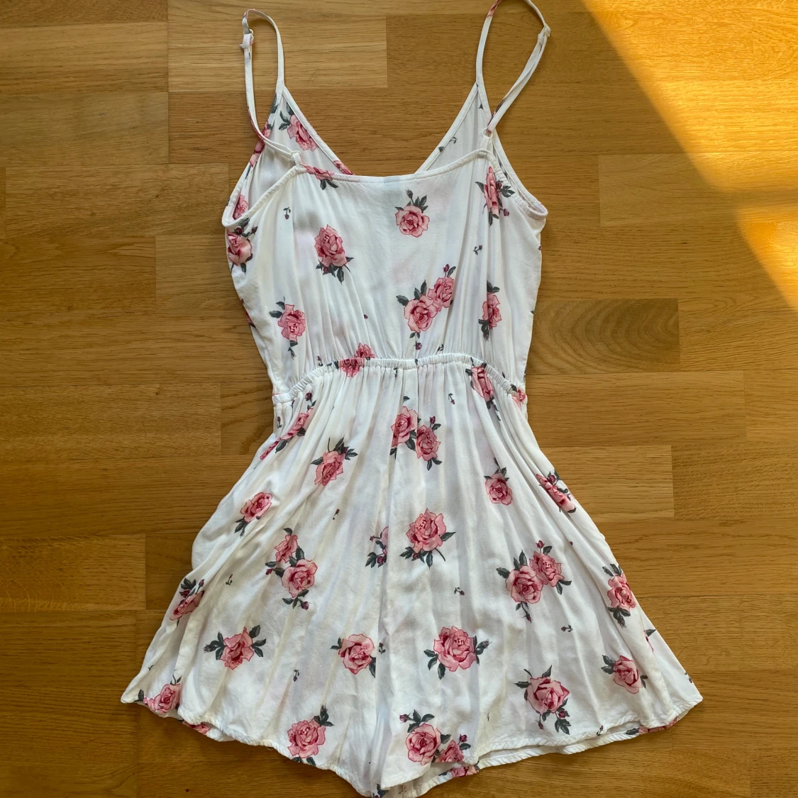 Blommig byxdress  - 90