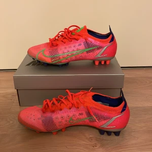 Nike vapor 14 elite AG  - Säljer skor för konstgräs, storlek 41. Använda ett fåtal gånger. Nike vapor 14 elite AG. 