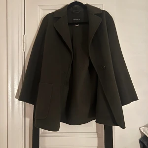 Jacka i ullmix från Stockh lm - Mycket bra skick. Storlek S.