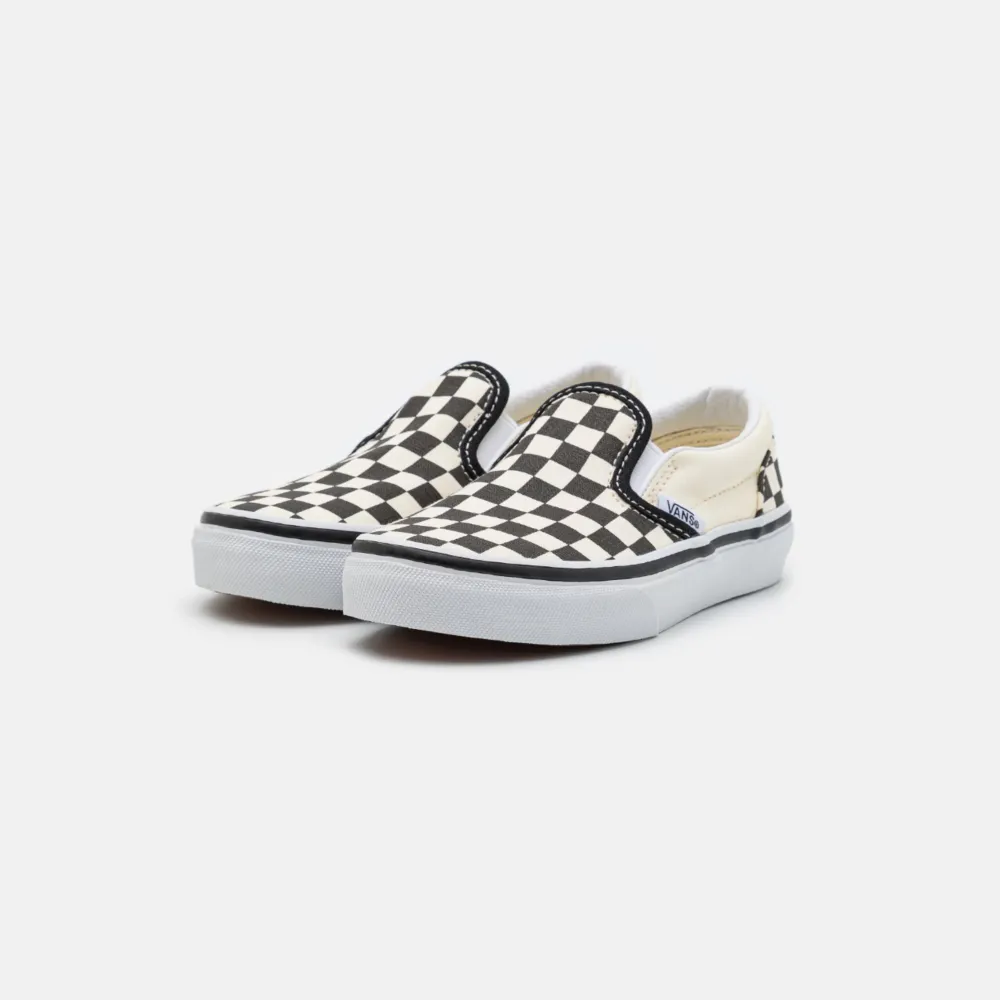 Vans rutiga skor i strl 38,5  (egna bilder kan fixas)  Bra skick inte används många gånger . Skor.