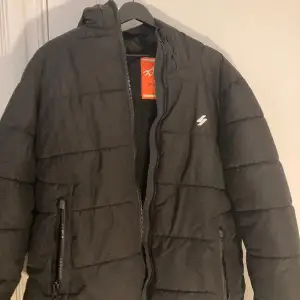 Black Super dry puffer, bought for 1599 skr 2 months ago. Selling because moving back overseas