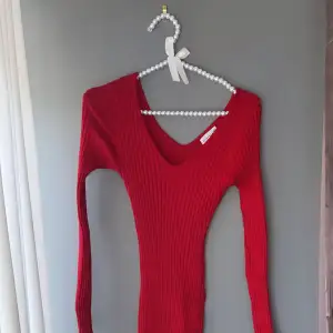Lång klänning i en väldigt fin röd färg 
