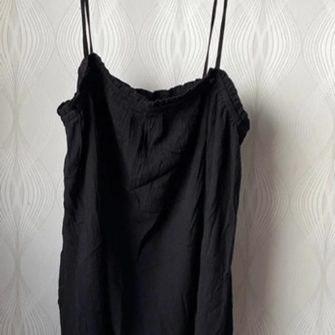 Helt ny långtop med axelband (L) Cubus