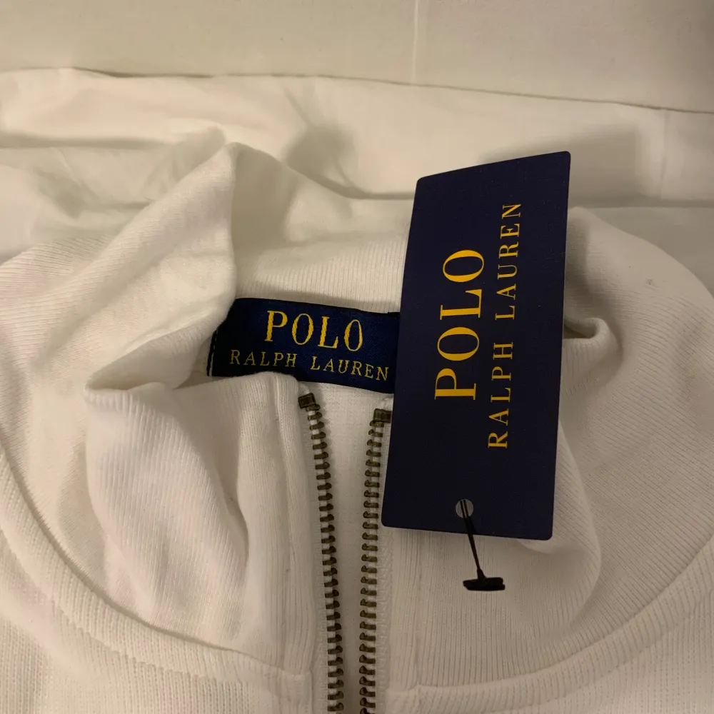 Color: white Size: L works if you are XL too (little bit big) Care label: Not recommended to machine wash if, (hand wash it). The material is really sensitive.  Comes with tags and the bag (Polo ralph lauren). Hoodies.