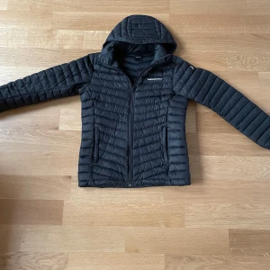 Dunjacka junior - Dunjacka i använt skick.