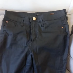 Fake läder/skinn byxor -  S/mindre M