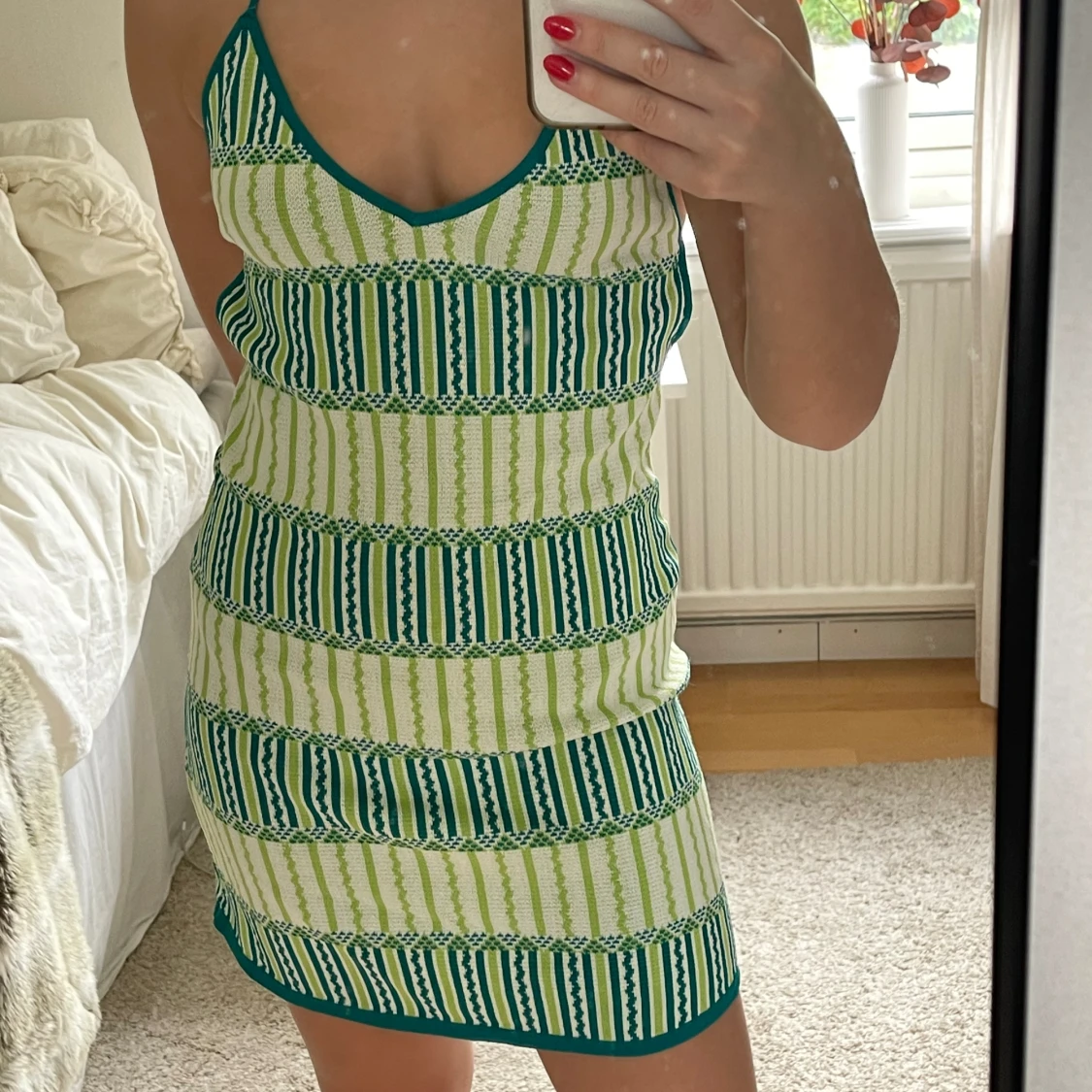 Kort stickad strandklänning