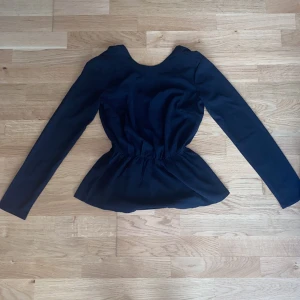 Blus  - Öppen i ryggen 