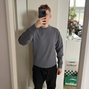 Grå sweatshirt från H&M 