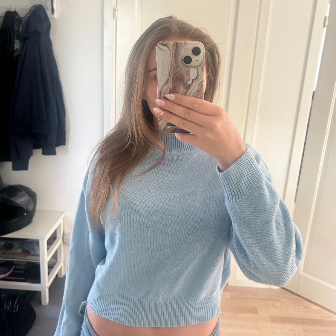 Ljusblå stickad tröja