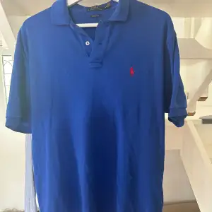 Blå Ralph lauren piké  Storlek M 