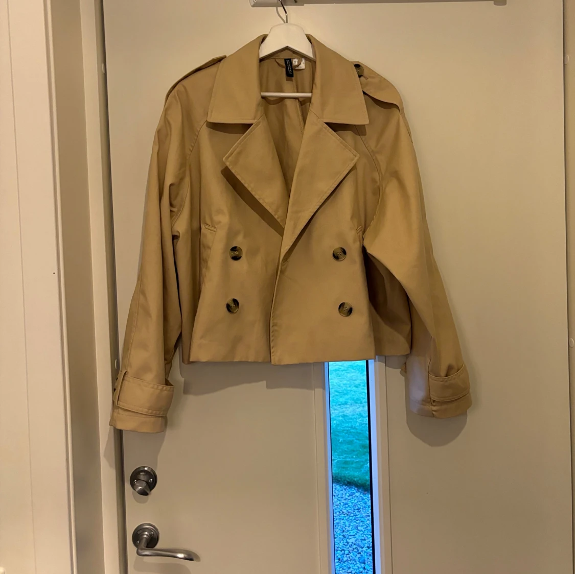 Kort trenchcoat  - 91