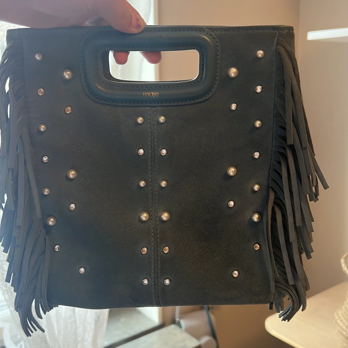 Fin blå maje väska