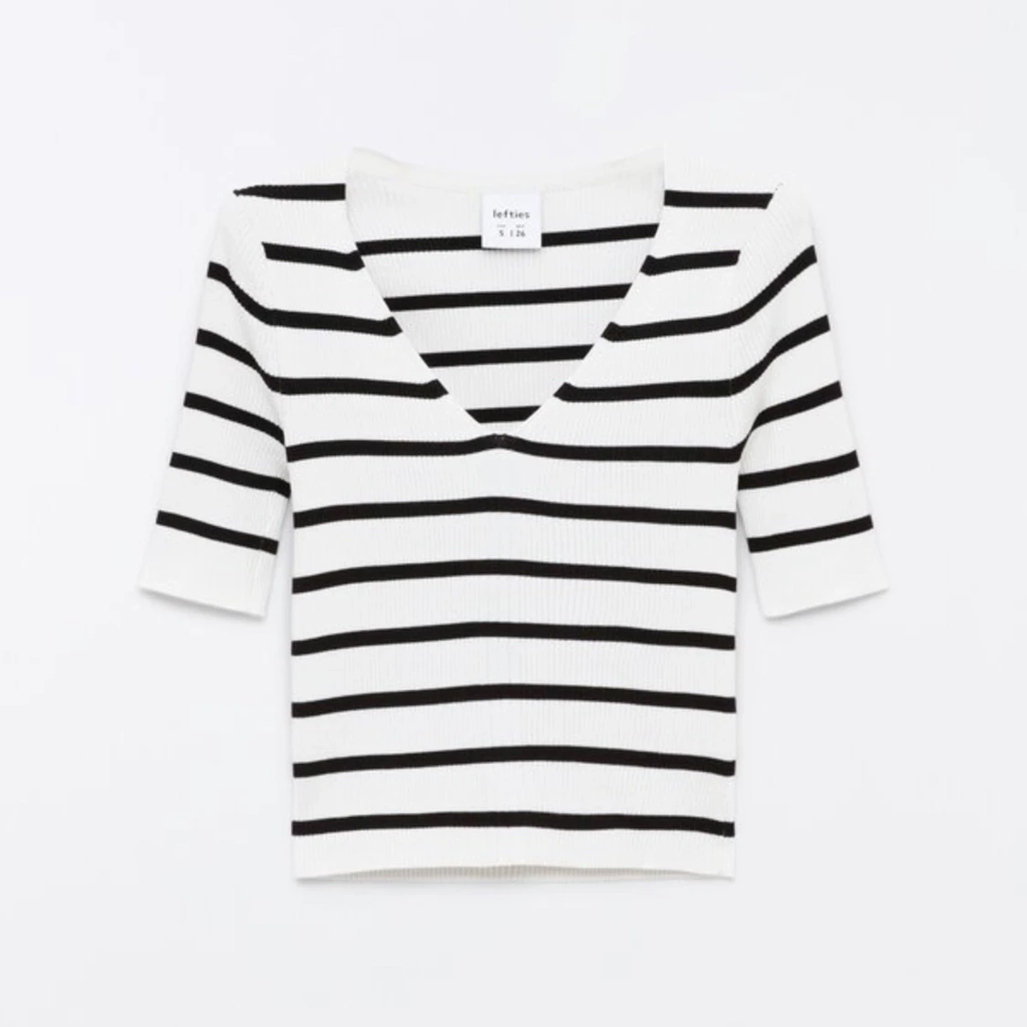 Topp ribbad och randig