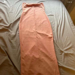 Tight ljus rosa klänning  - Bra skick, normal i storleken 