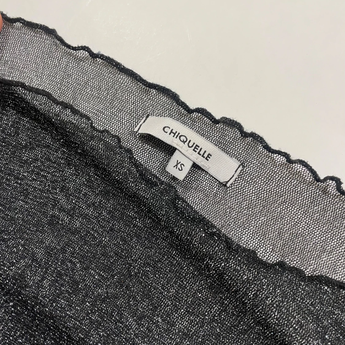 Glittrig mesh-topp - 91