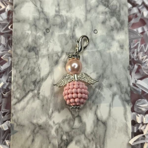 Rosa och silver lyckoängel  - Rosa och silver lyckoängel.