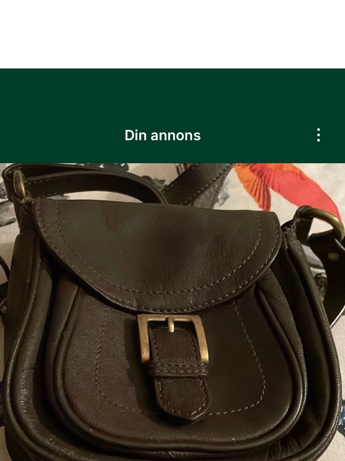 Axelremsväska i läder.