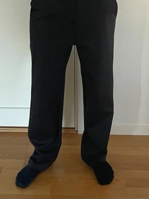 Kostymbyxor  - Svarta kostymbyxor. Storlek S.