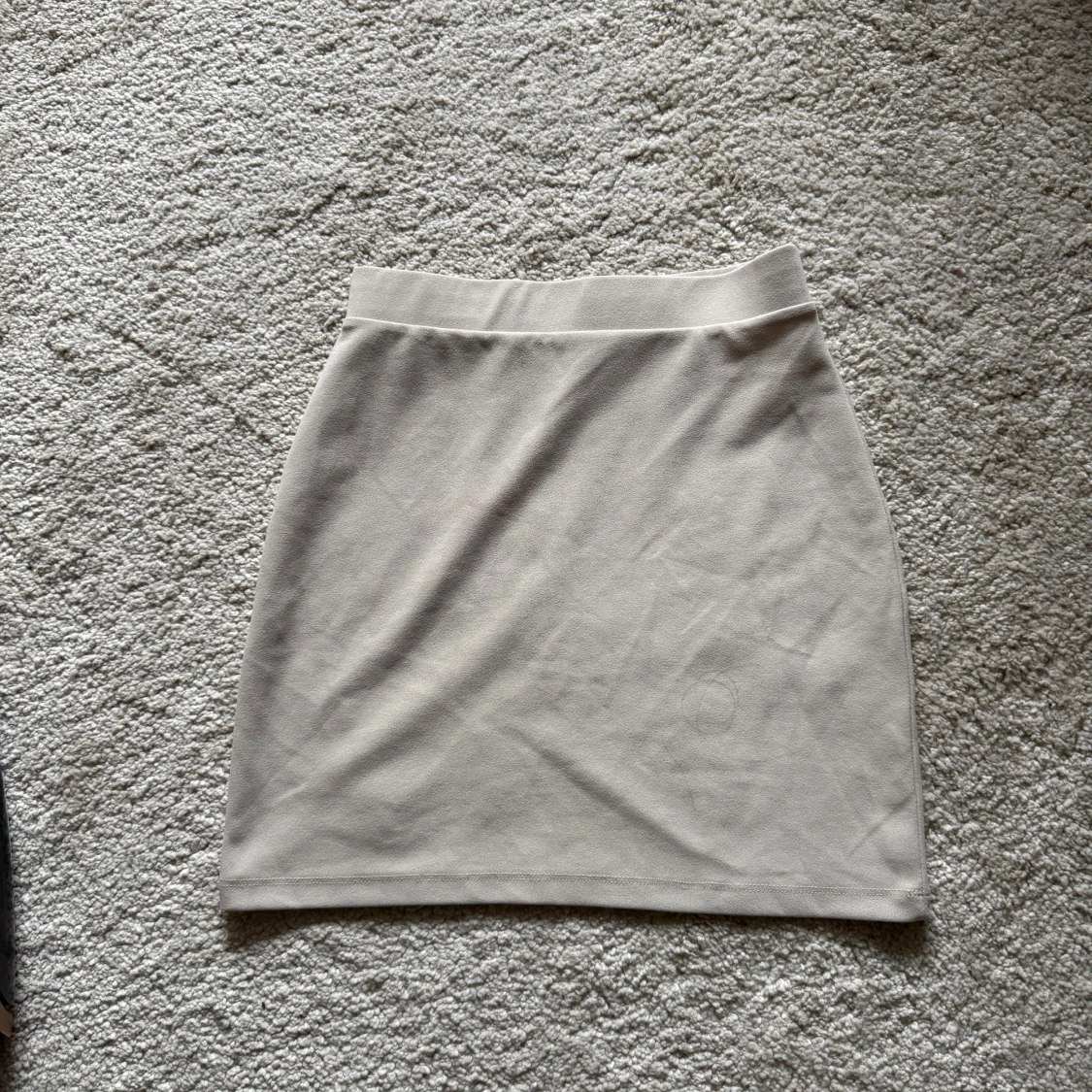 Beige kortkjol från NY Trend XS - 1