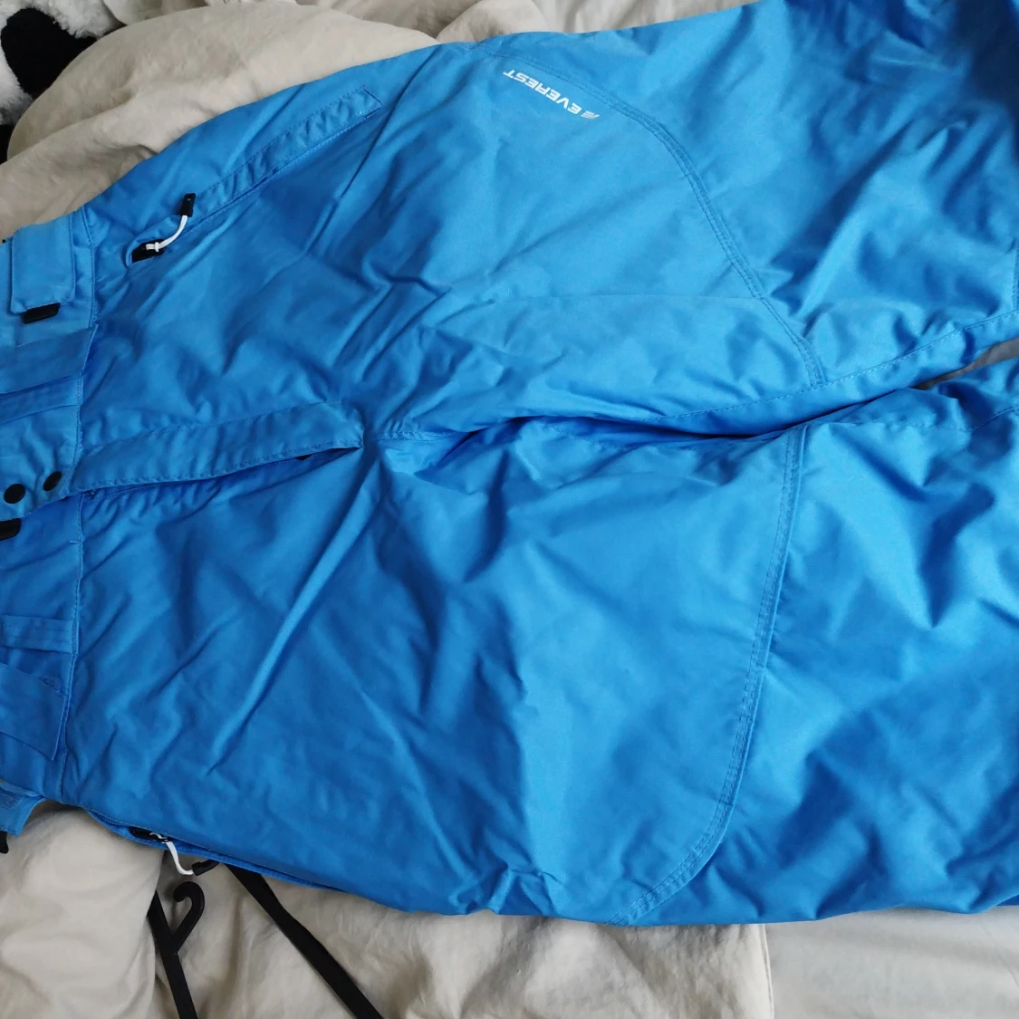 Blå täckbyxor Everest stl 40