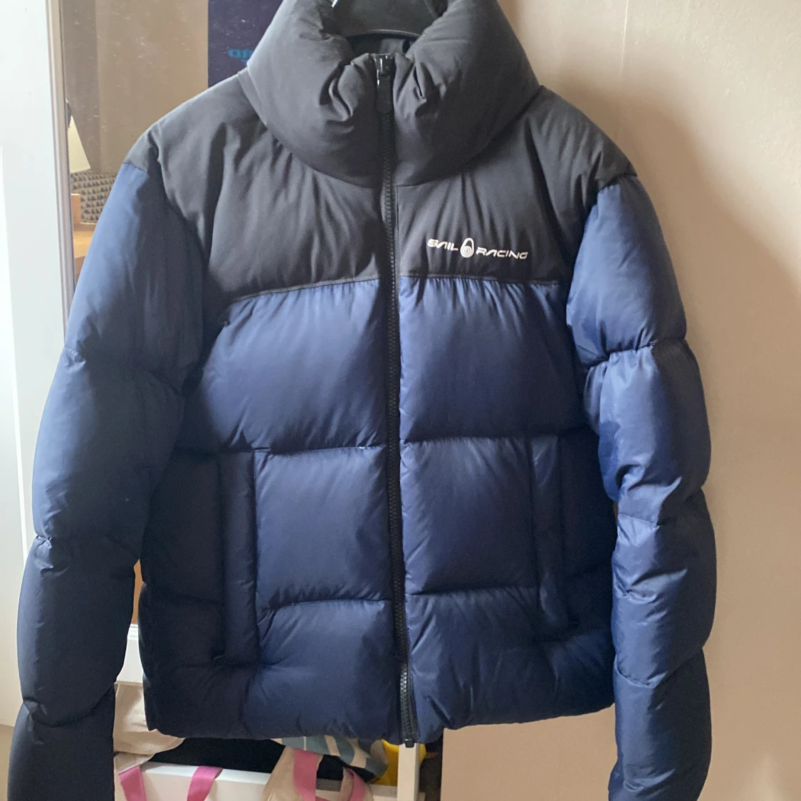 Mörkblå Sail Racing pufferjacka S